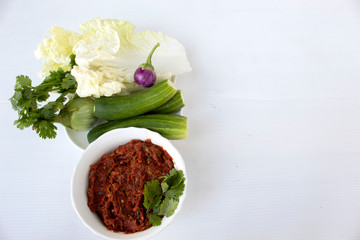 pickled fish chilli vegetables on white background