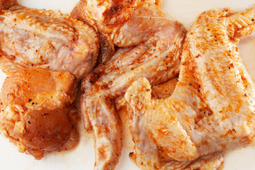 Wings marinated Set. Chicken Meat in Realistic Style for Fliers Banners Ads. Raw chicken wings isolated on white background, clipping path included. Meat shop.