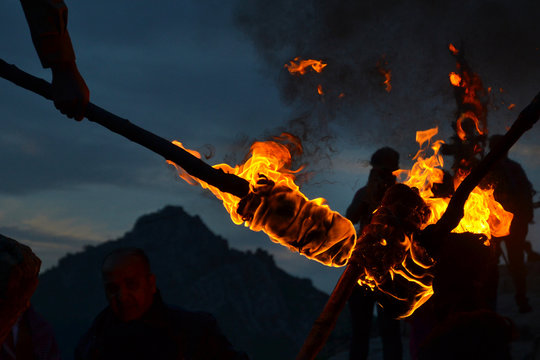 Detail of the flames of burning torches at the Nowruz / Novruz celebration near the city of Akre in Kurdish Iraq, a local tradition, men carry burning torches to the top of the mountains.