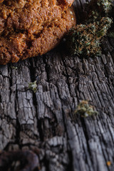 biscuits with hemp on an old wooden background close-up. rustic. Vertical orientation.