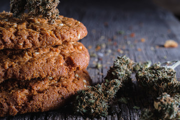 biscuits with hemp on an old wooden background close-up. rustic. Horizontal orientation.