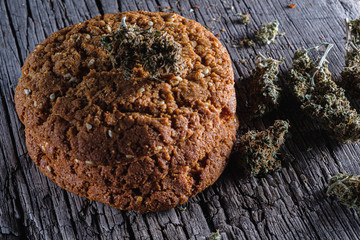 biscuits with hemp on an old wooden background close-up. rustic. Horizontal orientation.