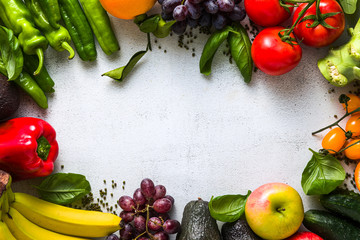Fresh vegetables and fruits on a white kitchen table. Background for supermarkets, fresh food stores, delivery.