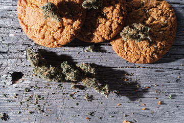 biscuits with hemp on an old wooden background close-up. rustic. Horizontal orientation.