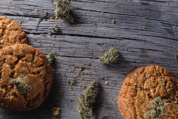 biscuits with hemp on an old wooden background close-up. rustic. Horizontal orientation.