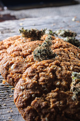 biscuits with hemp on an old wooden background close-up. rustic. Vertical orientation.