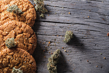 biscuits with hemp on an old wooden background close-up. rustic. Horizontal orientation.