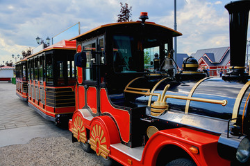 Russia, Kazan, June 2019. Close-up of a multicolored railless tourist train in an old retro style.