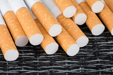 Macro shoot of cigarette filters. Heap of Tobacco Cigarettes.