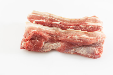 Pork belly isolated on white background. Top view. fresh ribs isolated on white background. With clipping path. Raw meat, farm and cooking concept. Meat shop.