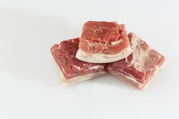 Pork belly isolated on white background. Top view. fresh ribs isolated on white background. With clipping path. Raw meat, farm and cooking concept. Meat shop.