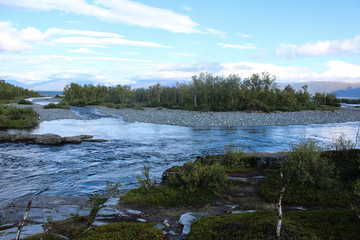 Large river in the arctic tundra. Abisko national park, Nothern Sweden