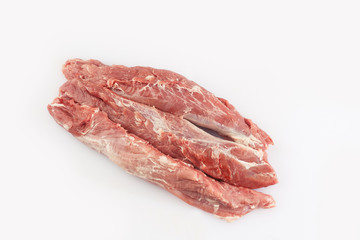 slices loin on a white background. Raw pork . Advertising for meat shop and farm. Various kinds of meat and ready to cook concept. Top view. Space for text