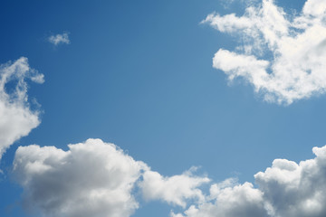 Fototapeta premium Blue sunny cloudy sky background