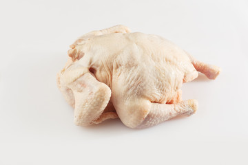 Raw whole chicken . Raw chicken carcass . The view from the top. Food Background. Copy space. Cooking content. Uncooked meat. Meat shop.