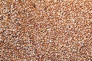 Top view of uncooked buckwheat. Background