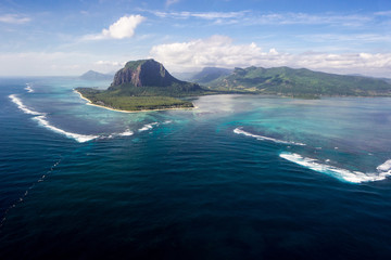 Incredible view of the famous underwater waterfall in Mauritius. Picture taken from helicopter