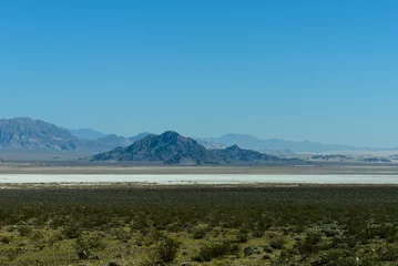 Fotobehang Hills and desert in Arizona, viewed from the road between Los Angeles and Las Vegas © parkerspics