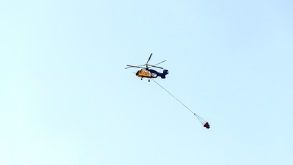 Fototapeta na wymiar Helocopter Ka 32 on fire operation, Cyprus.