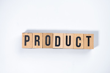" PRODUCT " text made of wooden cube on  White background.