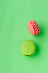 Colorful macaron cookies on white background.