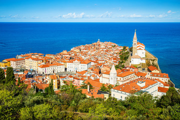 Historic city of Piran with Mediterranean Sea on a beautiful day - obrazy, fototapety, plakaty