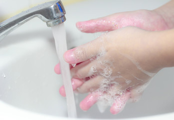 Coronavirus pandemic prevention wash hands with soap warm water frequently 
