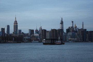 Manhattan, New York, USA - 20.12.2019: downtown Manhattan New York skyline skyscrapers  from ferry approaching city across Hudson river - New York, USA. stock video footage clip