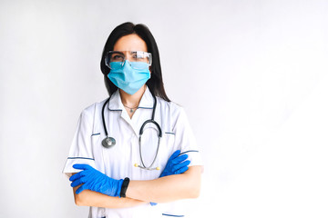 Doctor in protective workwear on a white background.