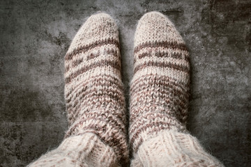 men's legs in warm knitted wool socks