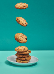 Cookies fall into a container.
