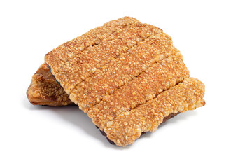 Close up view of crispy pork belly or deep fried pork isolated on white background with clipping path.