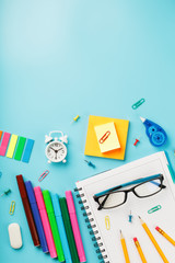 Stationery for school and creativity are on a blue background.