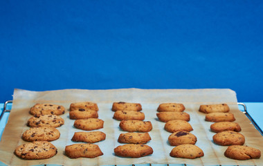 Homemade cookies with plain colored backgrounds.