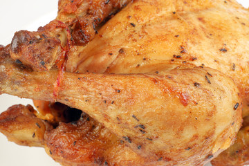 Whole roasted grilled chicken poultry bird on white background