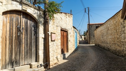 Fototapeta na wymiar Streets and old houses in the traditional village Lofu. Limassol District, Cyprus.