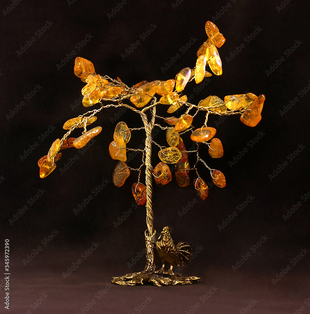 Wall mural Amber souvenir. Cock and Amber Tree. Background is dark brown or white (isolated image).