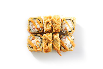 Shrimp rolls with cream cheese, tomatoes and Spicy sauce on white background top view