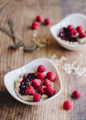 Breakfast with porridge and raspberries