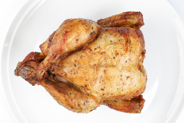 Whole roasted grilled chicken poultry bird on white background