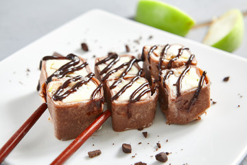 Chocolate pancake in ceramic white plate