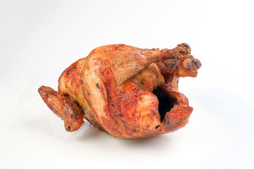 Whole roasted grilled chicken poultry bird on white background
