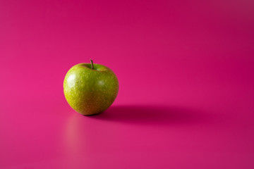 sour green apple on background