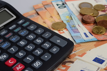 Calculator and euro cash bank notes