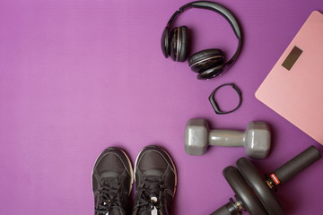 Fitness equipment on purple mat