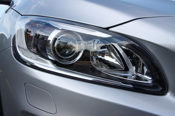 Obraz na płótnie Canvas headlight of a modern car