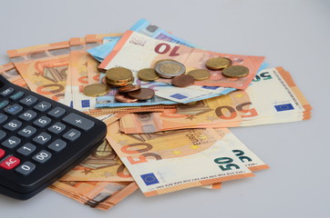 Calculator and euro cash bank notes