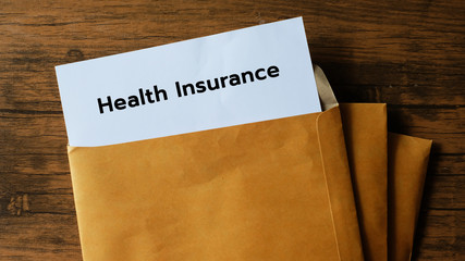 health insurance form, paperwork and questionnaire for insurance concepts.