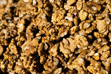 Closeup of big shelled walnuts pile