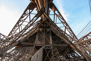 Fototapeta na wymiar View from beneath the Eiffel Tower